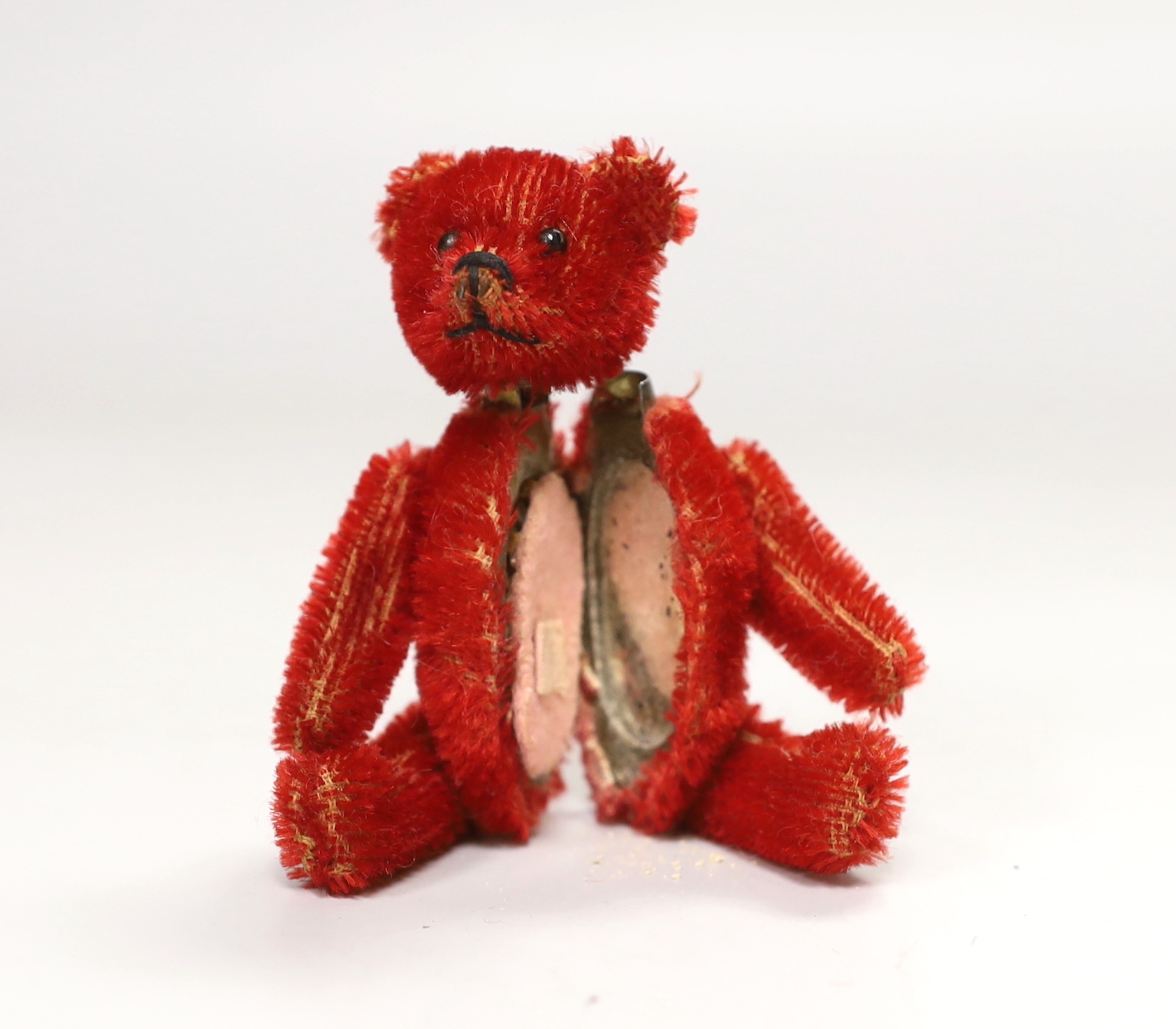 A Schuco compact bear, bright red mohair, c.1920, 4in., excellent condition